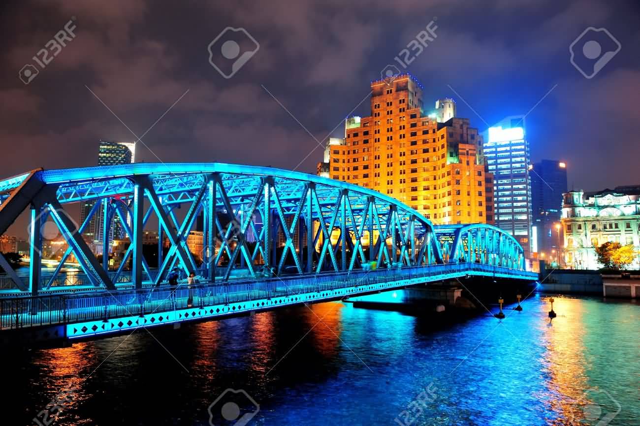Waibaidu Bridge At Night With Colorful Light Over River