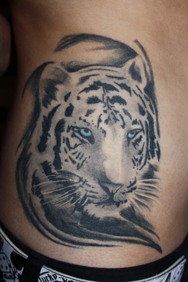 White And Black Tiger Head Tattoo On Side Rib