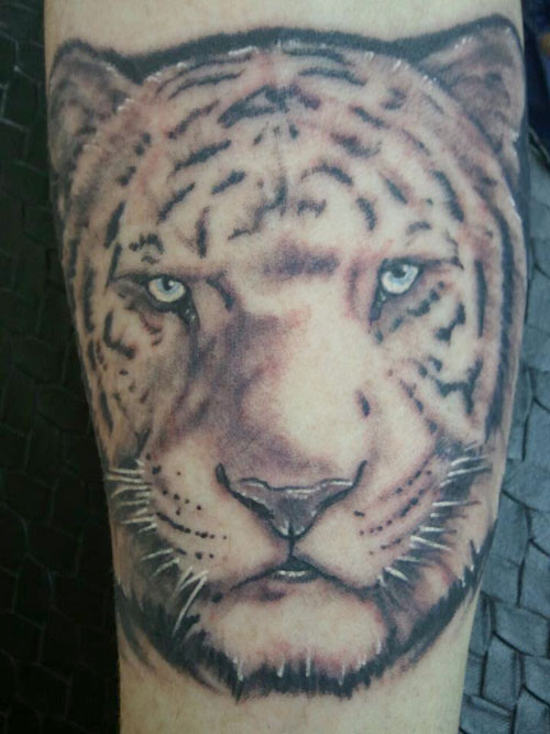 White Ink Tiger Face Tattoo On Sleeve