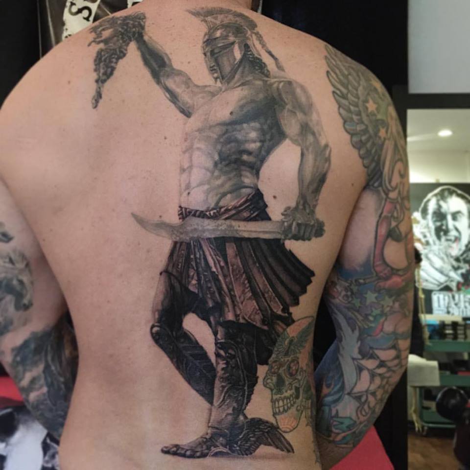 Wonderful Black Ink Perseus Tattoo On Man Full Back