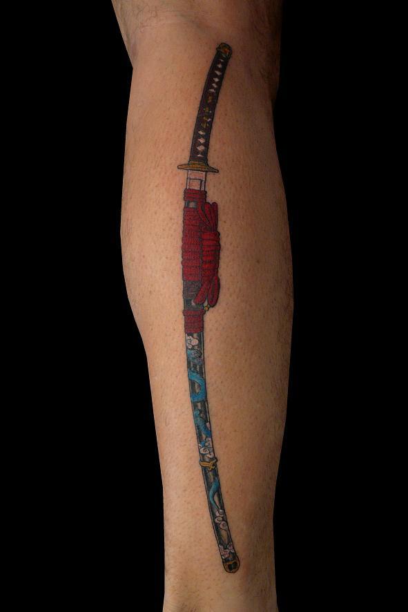 Wonderful Samurai Sword Tattoo Design For Leg Calf