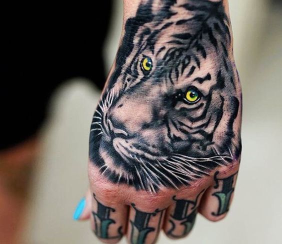 Yellow Eyes White Tiger Head Tattoo On Left Hand