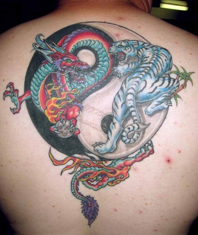 Yin Yang Dragon And Chinese Tiger Tattoo On Upper Back