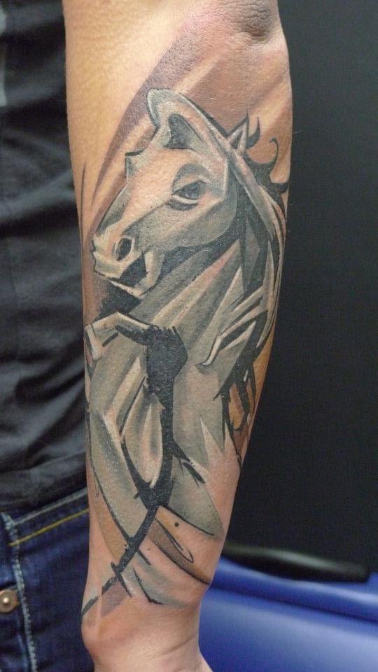 Abstract Black And Grey Horse Tattoo On Left Arm