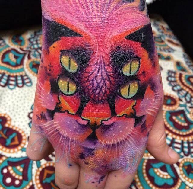 Abstract Cat Face Tattoo On Right Hand
