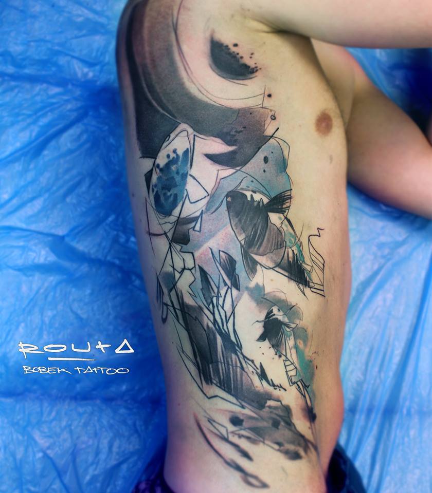 Abstract Fishes Tattoo On Right Side Rib By Martin Routa