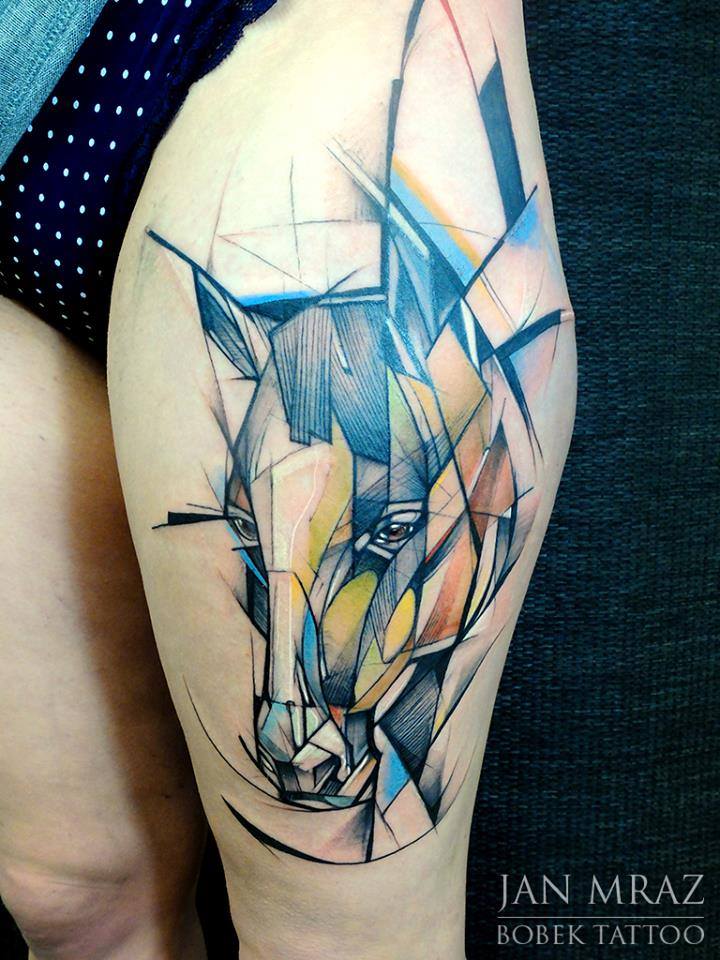 Abstract Horse Head Tattoo On Girl Left Thigh