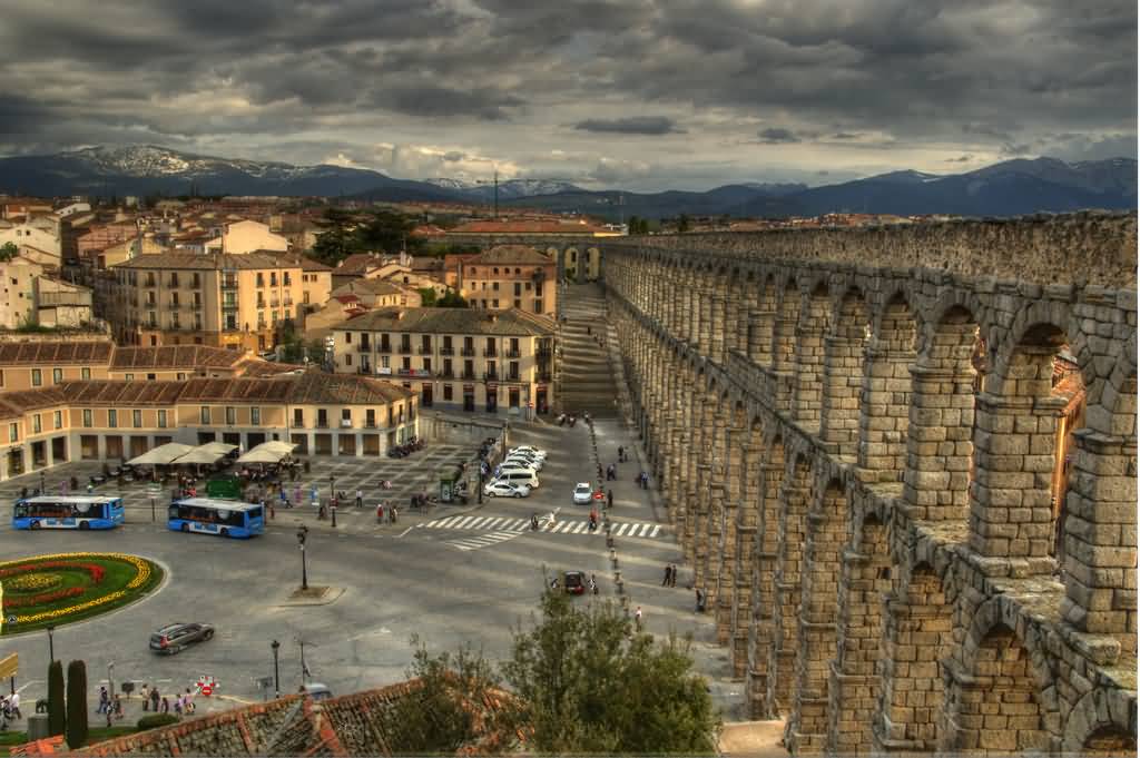 Aqueduct Of Segovia Amazing View With Black Clouds