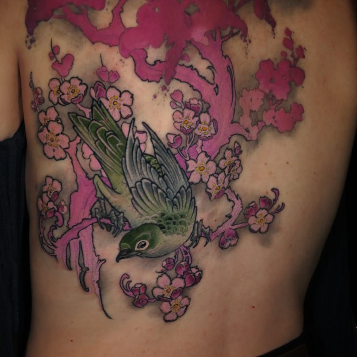 Attractive Bird On Branch Tattoo On Full Back