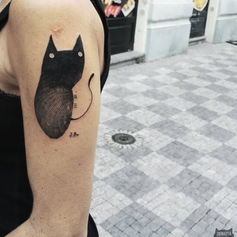 Attractive Black Ink Cat Tattoo On Left Shoulder By Panakota