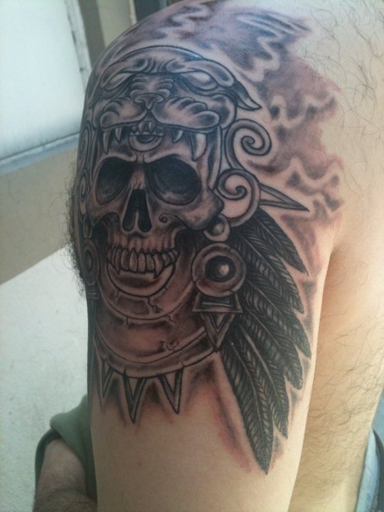Attractive Black Ink Skull Tattoo On Man Left Shoulder By Piglegion