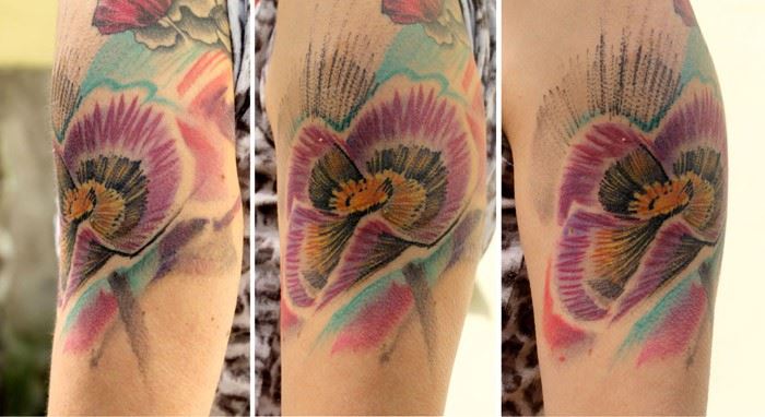 Attractive Flower Tattoo On Left Sleeve By Martin Routa