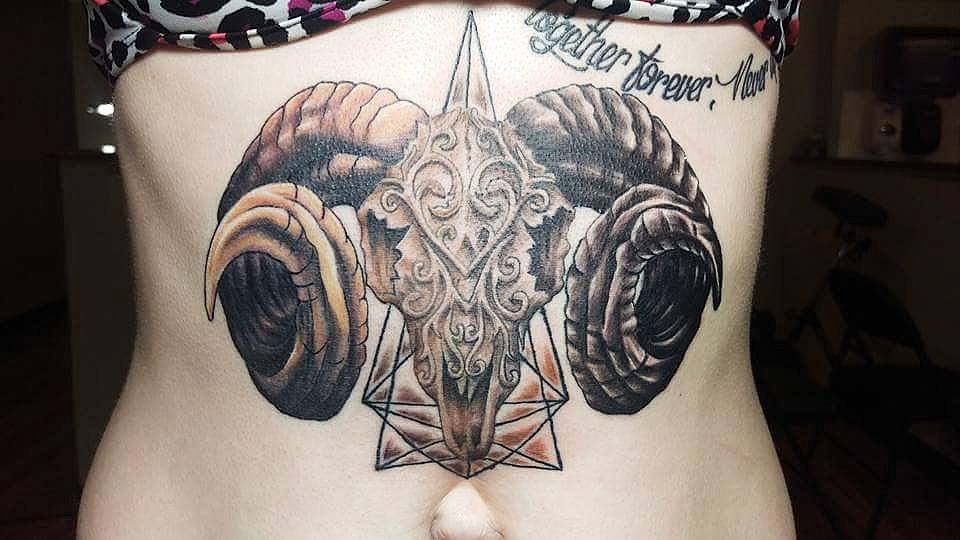 Attractive Goat Skull Tattoo On Girl Stomach By Laura Frego