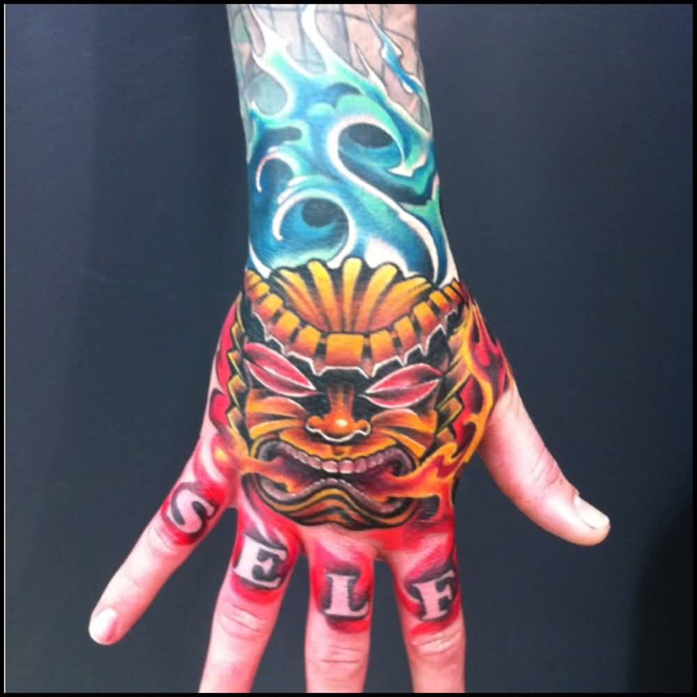 Attractive Mask Tattoo On Right Hand