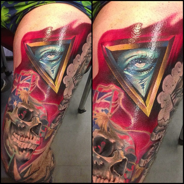 Awesome 3D Illuminati Eye With Skull Tattoo On Left Thigh