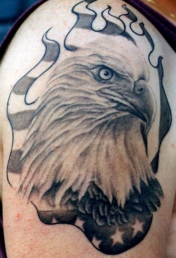 Awesome Black Ink Eagle Head Tattoo On Right Shoulder By Tom Renshaw