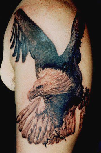 Awesome Black Ink Flying Eagle Tattoo On Man Left Half Sleeve By Tom Renshaw