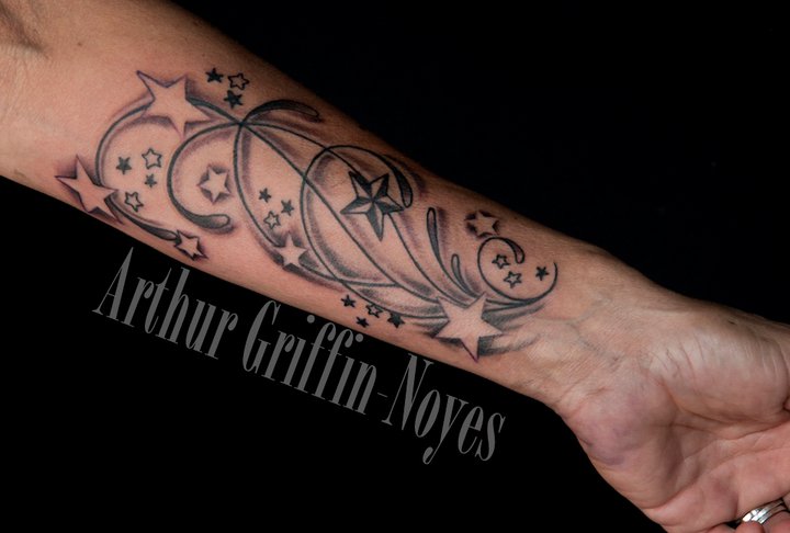 Awesome Black Ink Stars Tattoo On Left Forearm