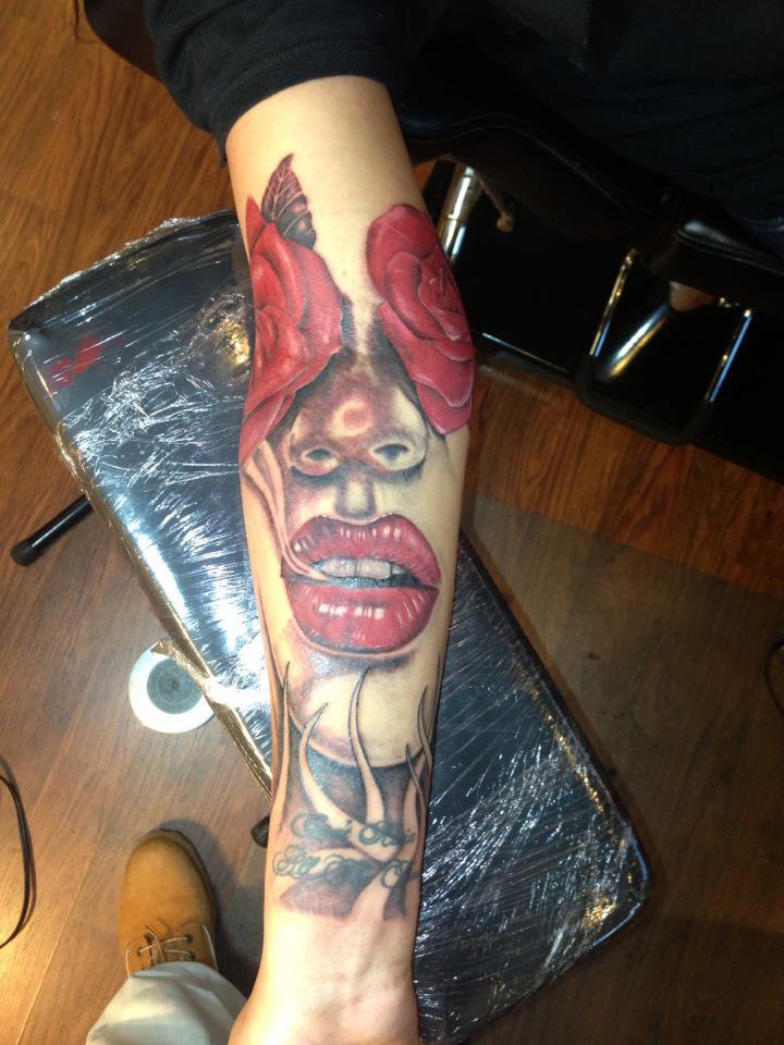 Awesome Rose Eye Women Face Tattoo On Left Forearm