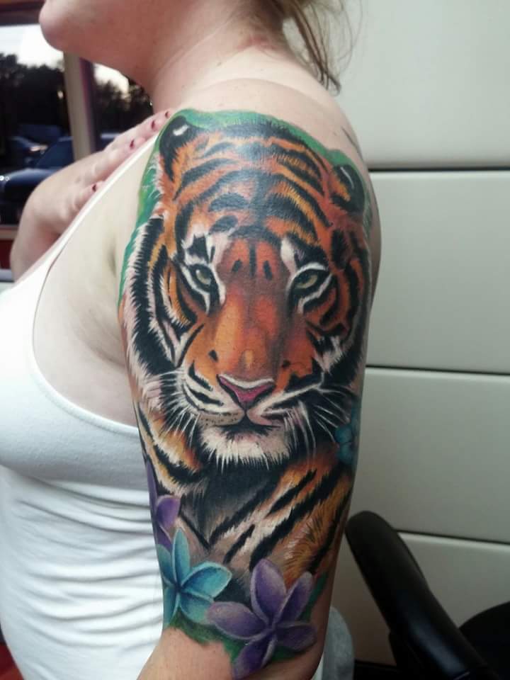 Awesome Tiger Head Tattoo On Women Left Half Sleeve
