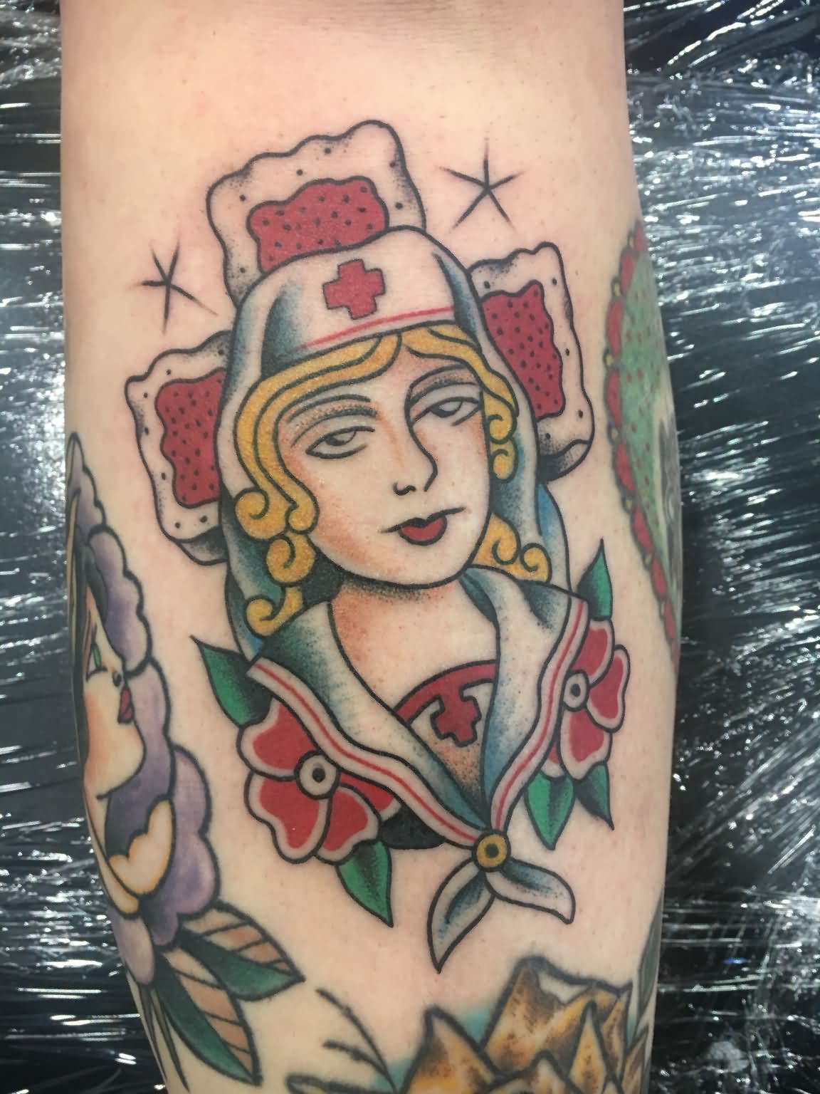 Awesome Traditional Nurse Tattoo On Right Forearm