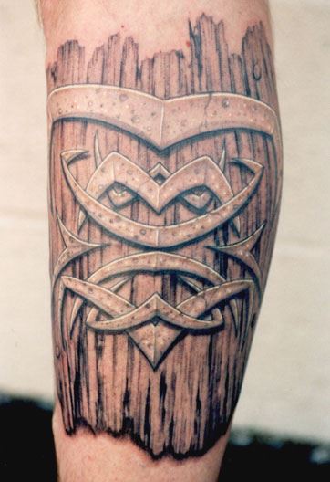 Awesome Tribal Design Tattoo On Leg