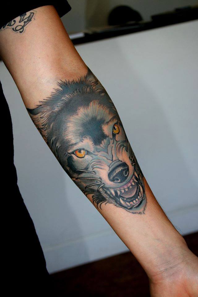 Awesome Wolf Head Tattoo On Left Forearm By Jeff Norton