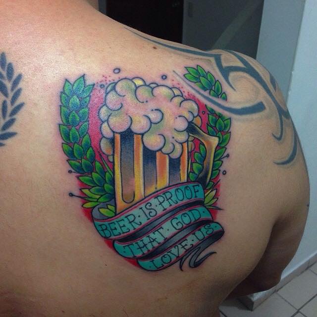 Beer Mug With Banner Tattoo On Right Back Shoulder