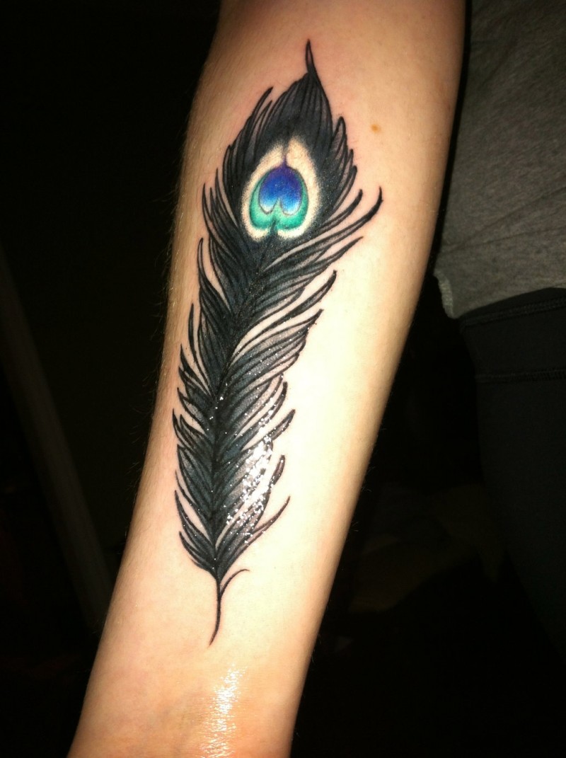 Black And Color Peacock Feather Tattoo On Forearm