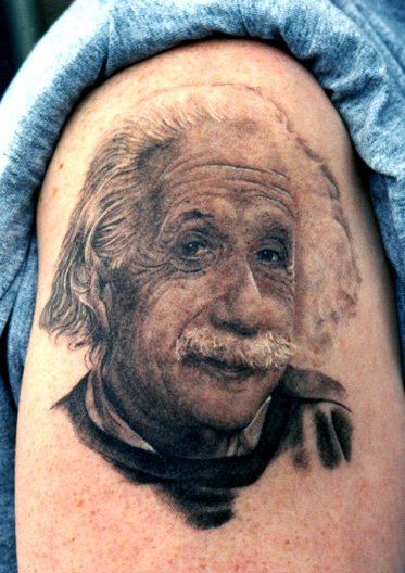 Black And Grey Albert Einstein Portrait Tattoo On Right Shoulder By Tom Renshaw