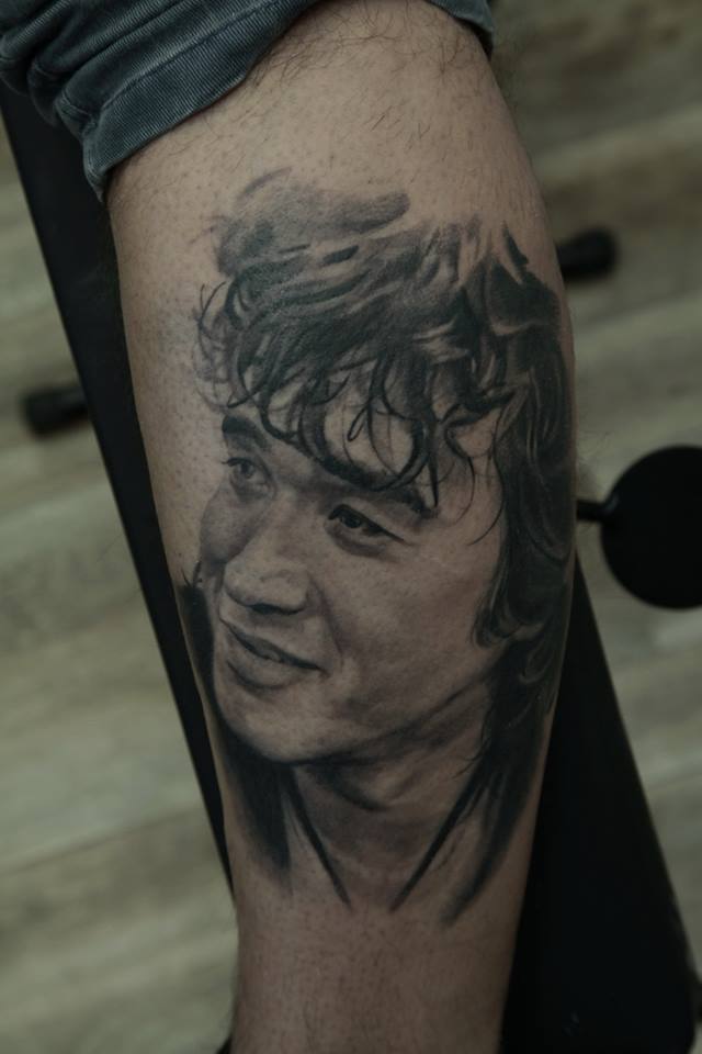 Black And Grey Man Face Tattoo Design For Leg By Dmitriy Samohin