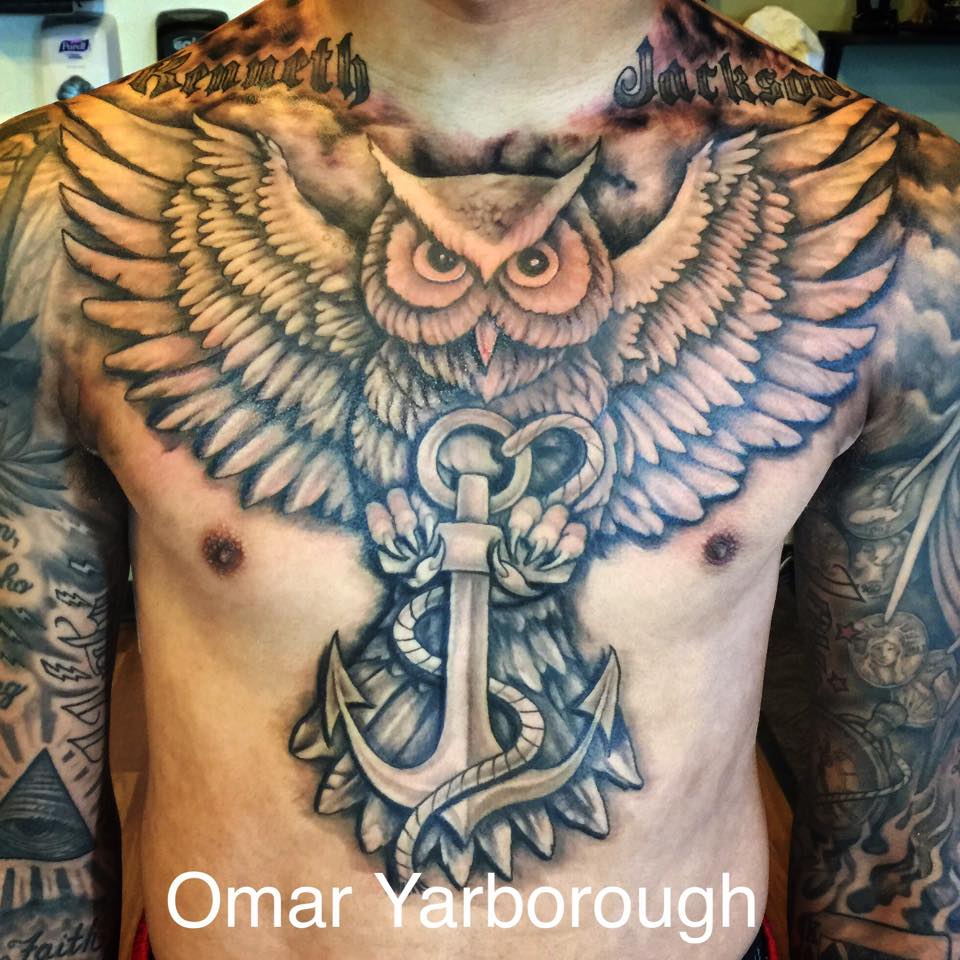 Black And Grey Owl With Anchor Tattoo On Man Chest By Omar
