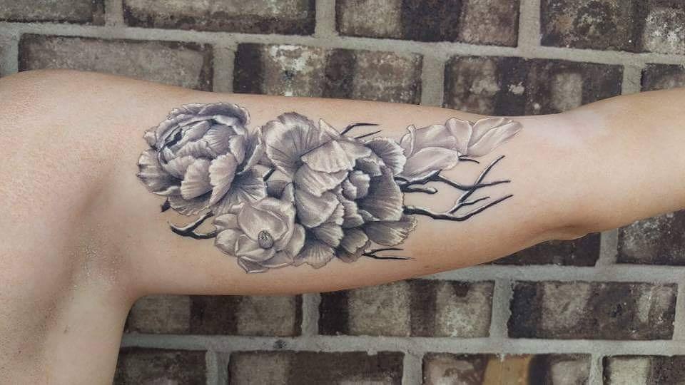 Black And Grey Peony Flowers Tattoo On Left Bicep