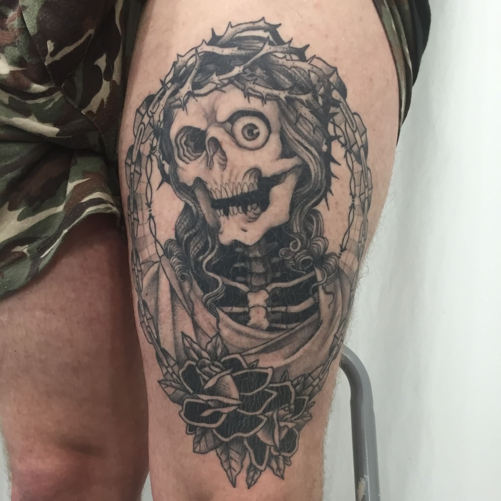Black And Grey Skeleton In Frame Tattoo On Left Thigh