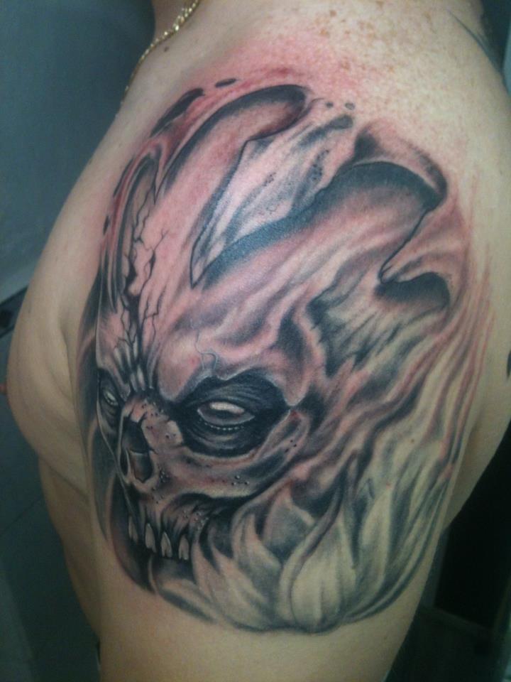 Black And Grey Skull Tattoo On Man Left Shoulder By Piglegion