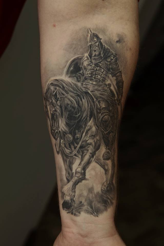 Black And Grey Warrior On Horse Tattoo On Forearm