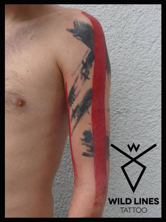 Black And Red Abstract Tattoo On Man Left Half Sleeve