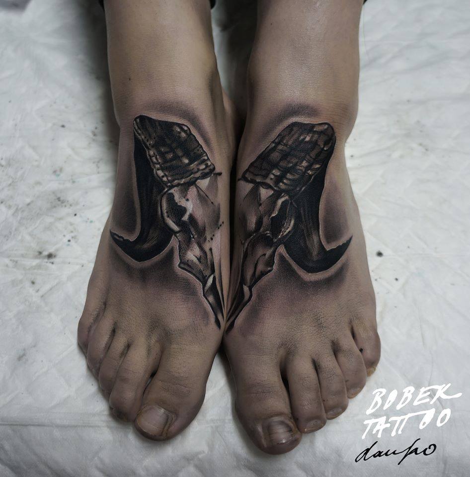 Black Ink Animal Skull Tattoo On Feet By Dan Ko