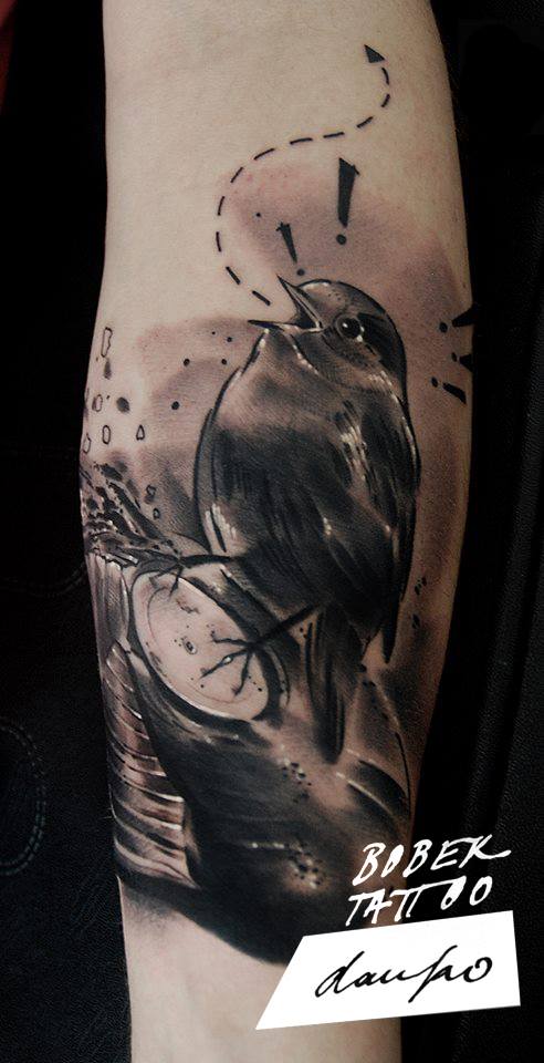 Black Ink Bird Tattoo On Forearm