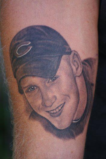 Black Ink Boy Portrait Tattoo On Sleeve