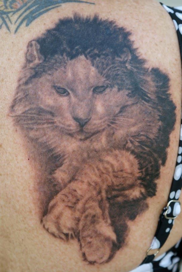 Black Ink Cat Tattoo Design For Shoulder By Tom Renshaw