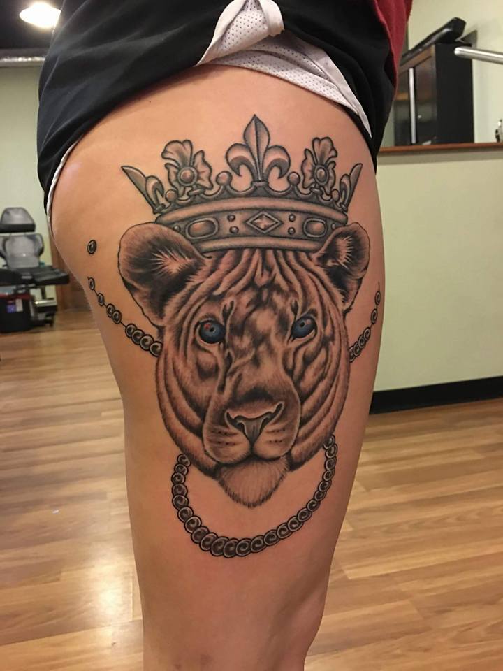 Black Ink Crown On Lioness Tattoo On Right Side Thigh