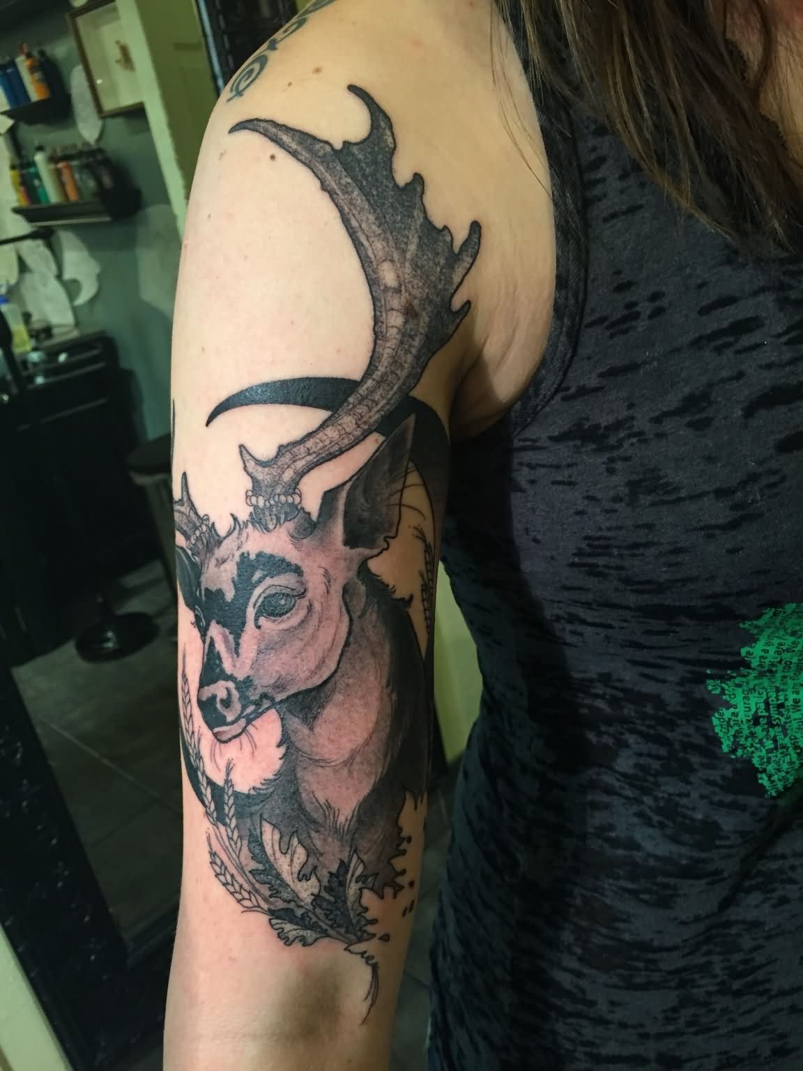 Black Ink Deer Head Tattoo On Women Right Half Sleeve
