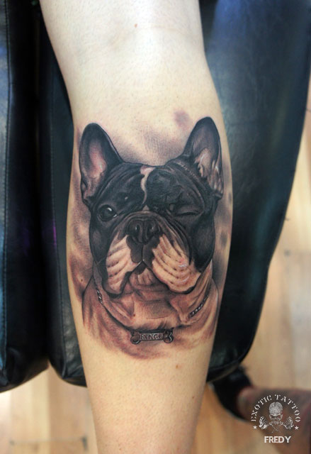 Black Ink Dog Head Tattoo On Leg Calf