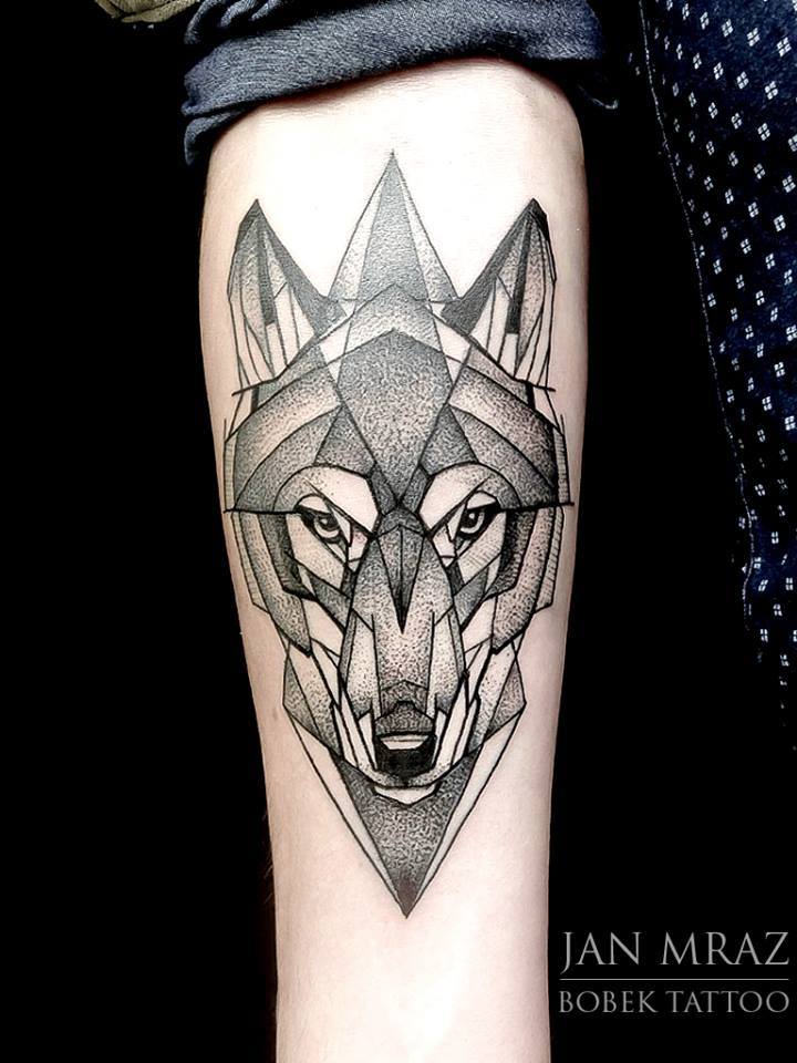 Black Ink Dotwork Wolf Head Tattoo On Forearm