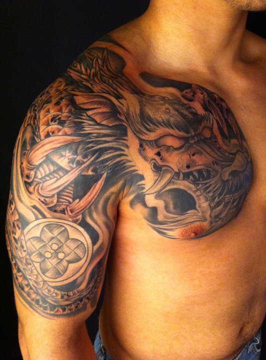 Black Ink Dragon Tattoo On Man Right Half Sleeve And Chest