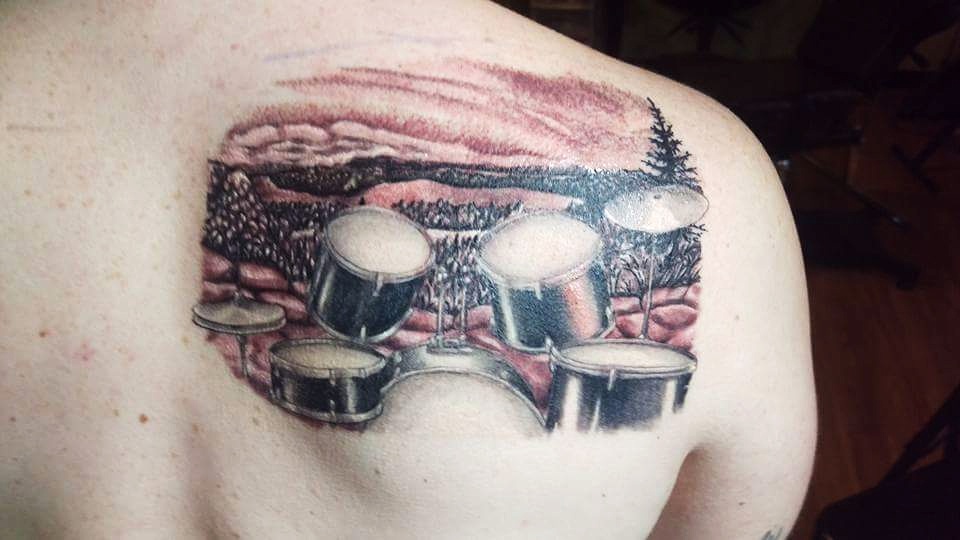 Black Ink Drum Set Tattoo On Man Right Back Shoulder