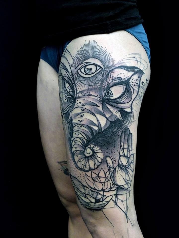 Black Ink Elephant Head With Lotus Tattoo On Left Thigh