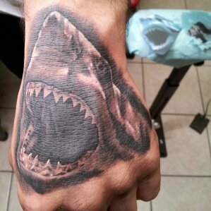 Black Ink Evil Shark Tattoo On Left Hand