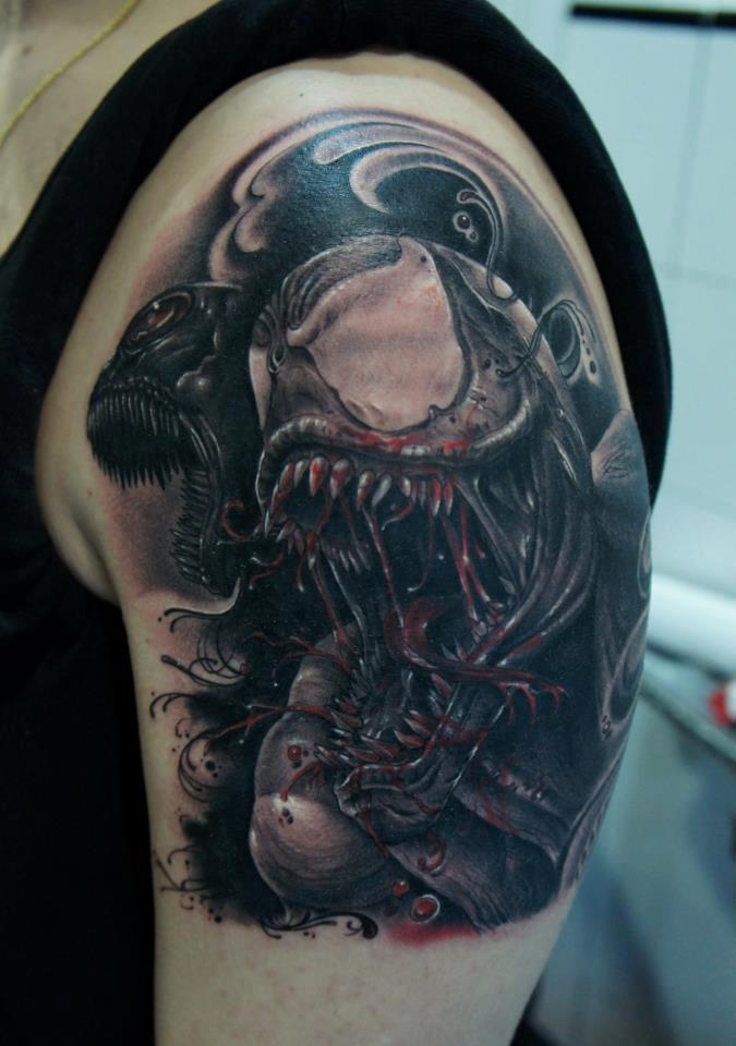 Black Ink Evil Venom Tattoo On Left Shoulder By Fredy